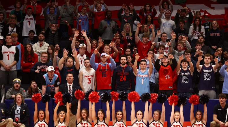 Dayton fans in the Red Scare student section wait for a free-throw attempt by the Flyers against Longwood on Saturday, Dec. 30, 2023, at UD Arena. David Jablonski/Staff