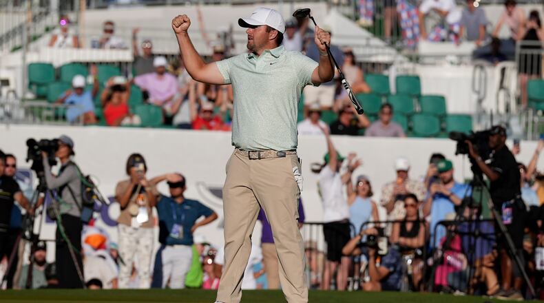 Chris Gotterup celebrates his win after sinking a birdie putt on the first playoff hole at the 18th green during the final round of the Phoenix Open golf tournament Sunday, Feb. 8, 2026, in Scottsdale, Ariz. (AP Photo/Ross D. Franklin)
