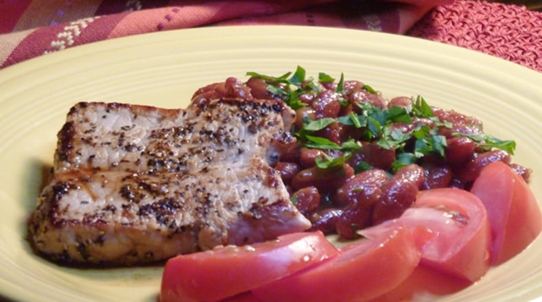 Cracked Pepper Pork with Honey Mustard Baked Beans. (Linda Gassenheimer/TNS)