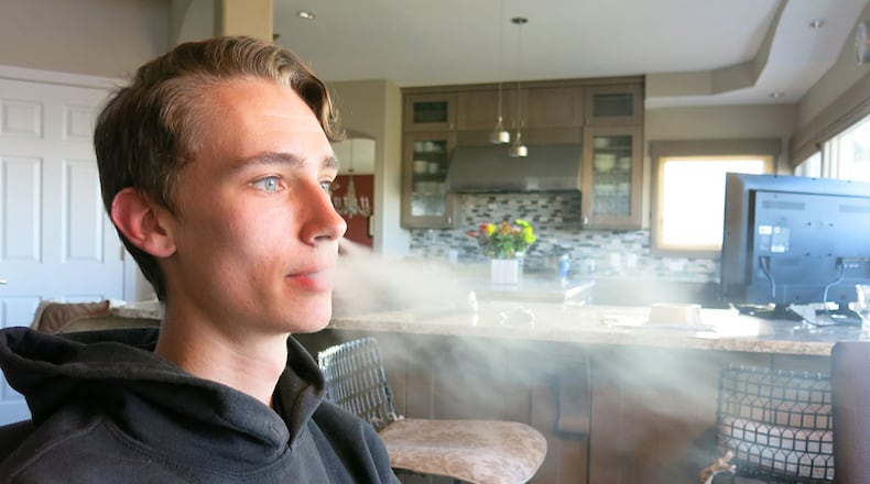 Julien Lavandier, a Colorado State University student, started smoking e-cigarettes as a high school sophomore. He says he’s now hooked on Juul and has been unable to quit. (John Daley/Kaiser Health News/TNS)