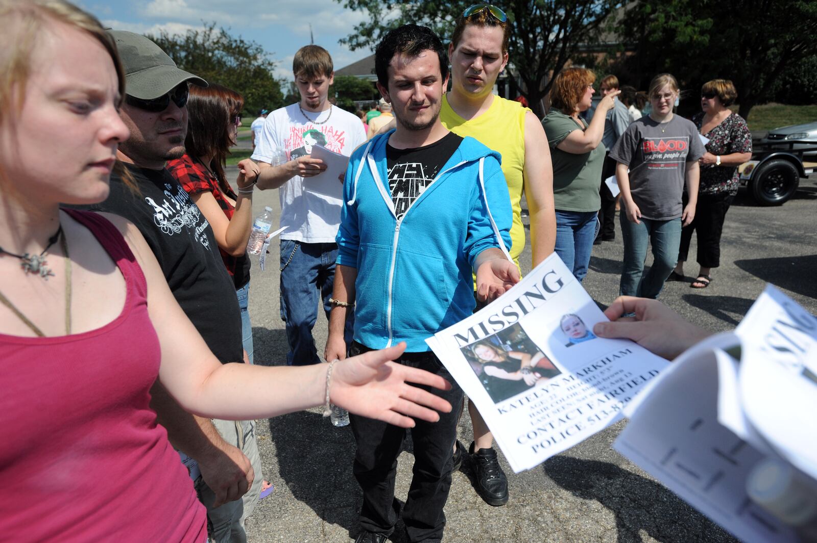 Over 100 family, friends and supporters turned out Tuesday, August 12 to help search for clues in the disappearance of Katelyn Markham, 22, who was last heard from on Sunday. Staff photo by Samantha Grier.