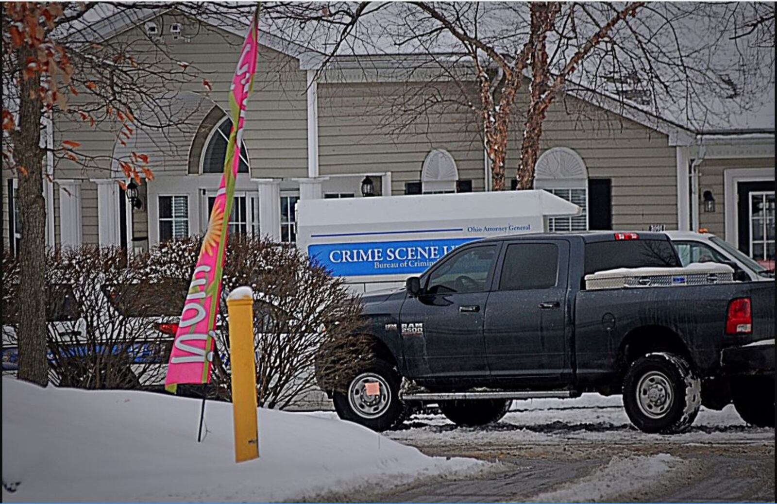 The scene Friday morning on Sagebrook Drive in Miami Twp. (Marshall Gorby/Staff)