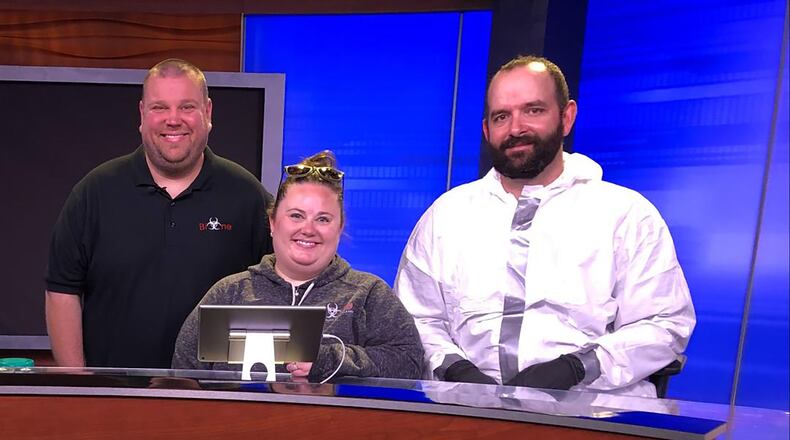 Jonathan (left) and Samantha Schaffer (center) own Bio-One Dayton, a company that offers crime scene, hazardous material, hoarding and post-coronavirus infection clean up. The company now has four full-time employees, including Andrew Grant (right) who met Jonathan when they were both firefighters in Dayton. CONTRIBUTED