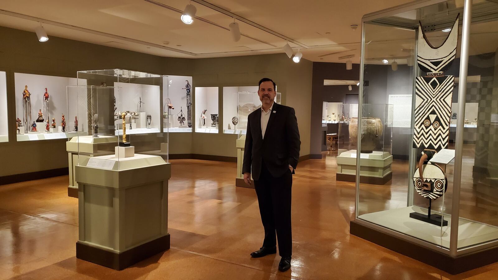 Dayton Art Institute director Michael Roediger stands in one of his favorite spots: the Bonbright Gallery of African Art. CONTRIBUTED