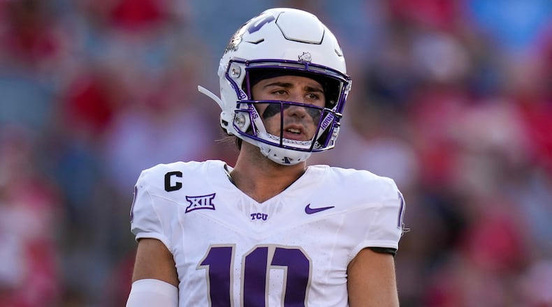 FILE - TCU quarterback Josh Hoover (10) plays against Houston during the first half of an NCAA college football game, Saturday, Nov. 22, 2025, in Houston. (AP Photo/Eric Christian Smith,File)