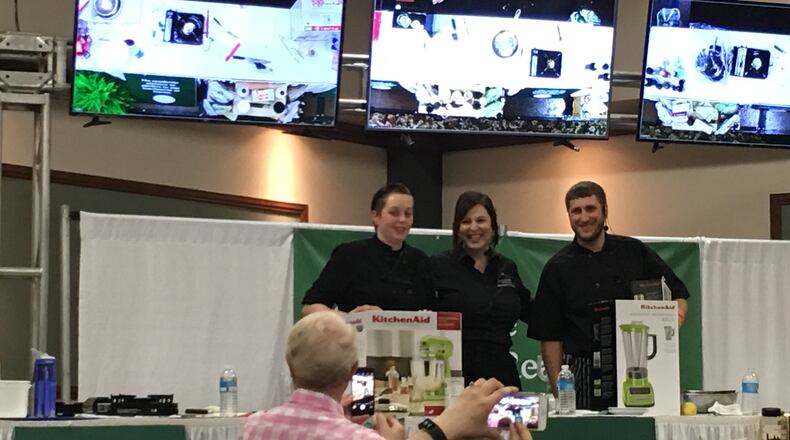 Crystal Coppock of Wheat Penny Oven and Bar, Maria Walusis of Nibbles and Aaron Braun of Meadowlark Restaurant on stage at the finals for the second annual Chef Showdown. Photo by Alexis Larsen