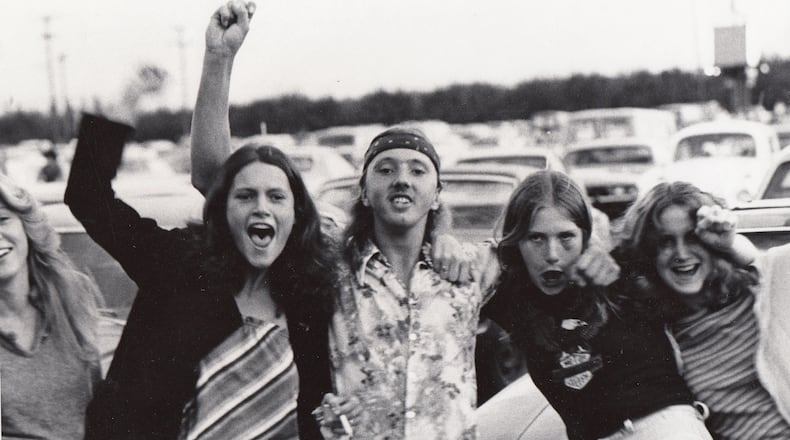 Friends gather outside of Hara Arena before a 1980 AC/DC concert. DAYTON DAILY NEWS ARCHIVE