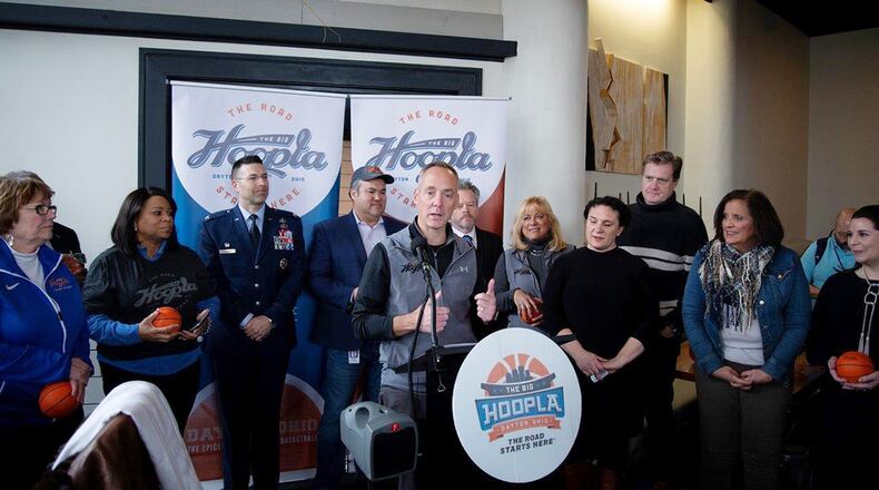 Col. Thomas Sherman, 88th Air Base Wing and Installation commander, attends a press conference with Jeff Hoagland of the Dayton Defense Coalition, U.S. Rep Mike Turner and other community officials to announce the Big Hoopla Festival. The event for boys and girls grades K-8 will happen March 15 at Chaminade Julienne Catholic High School and the Oregon Historic District, both in Dayton. (U.S. Air Force photo/John Van Winkle)