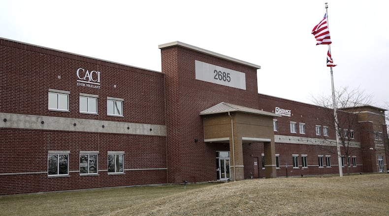 The College Park development on Pentagon Boulevard in Beavercreek has been building out to accommodate many government contractors that do business with the Air Force. New economic impact numbers based on Department of Defense reporting and a private analysis show direct and indirect business and employee spending from Wright-Patterson, Dayton VA and Springfield Air National Guard base infuses $16.68 billion into the local economy. TY GREENLEES / STAFF