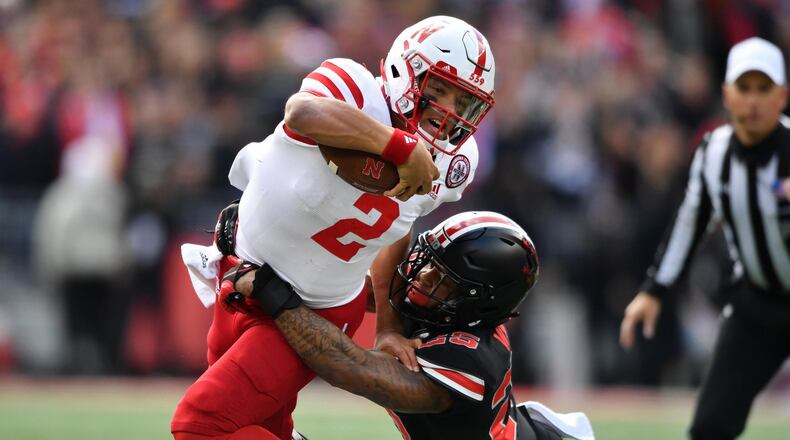 COLUMBUS, OH - NOVEMBER 3: Quarterback Adrian Martinez #2 of the Nebraska Cornhuskers is hauled down by Brendon White #25 of the Ohio State Buckeyes in the second quarter at Ohio Stadium on November 3, 2018 in Columbus, Ohio. (Photo by Jamie Sabau/Getty Images)