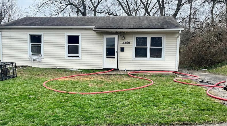A man's body was found inside a Gardendale Avenue house, where Trotwood firefighters rescued four dogs on March 11, 2023. CONTRIBUTED