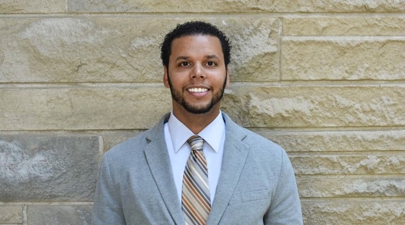 Garrett Carter teaches a class on college and lifelong learning at Indiana University while he pursues his Ph.D. in Education Policy Studies there.