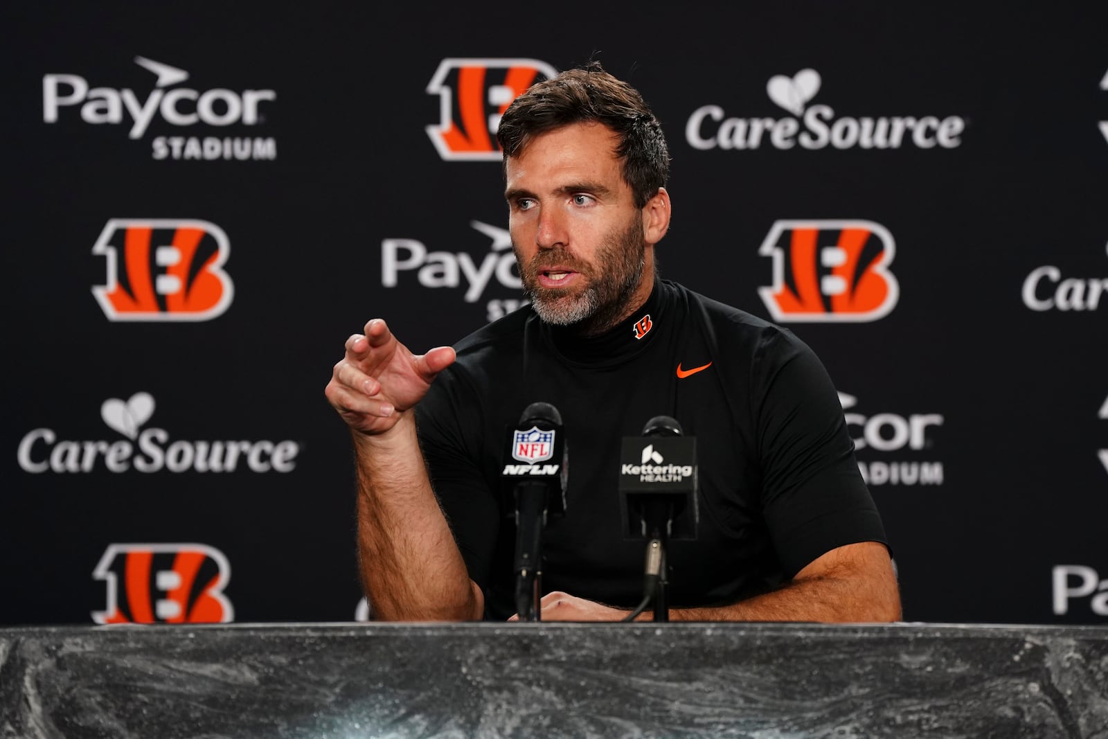 Cincinnati Bengals quarterback Joe Flacco (16) speaks after his team's loss to the Chicago Bears in an NFL football game, Sunday, Nov. 2, 2025, in Cincinnati. (AP Photo/Jeff Dean)
