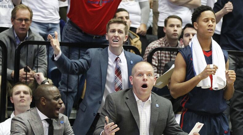 Dayton assistant coach Kevin Kuwik reacts to a call against George Washington on Friday, Feb. 6, 2015, at the Smith Center in Washington. David Jablonski/Staff
