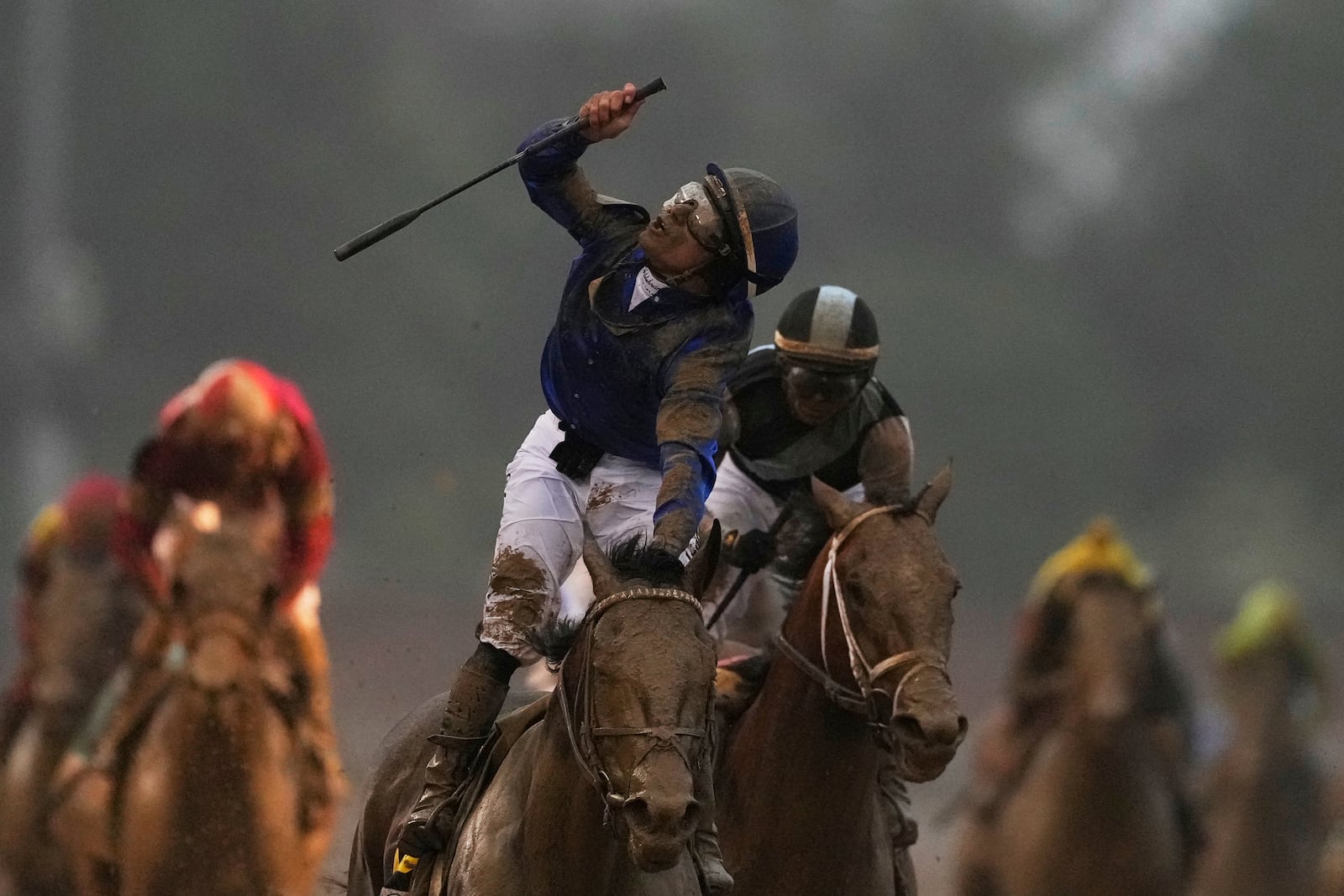 Jockey Junior Alvarado celebrates after riding Sovereignty to victory in the 151st running of the Kentucky Derby horse race at Churchill Downs Saturday, May 3, 2025, in Louisville, Ky. (AP Photo/Brynn Anderson)