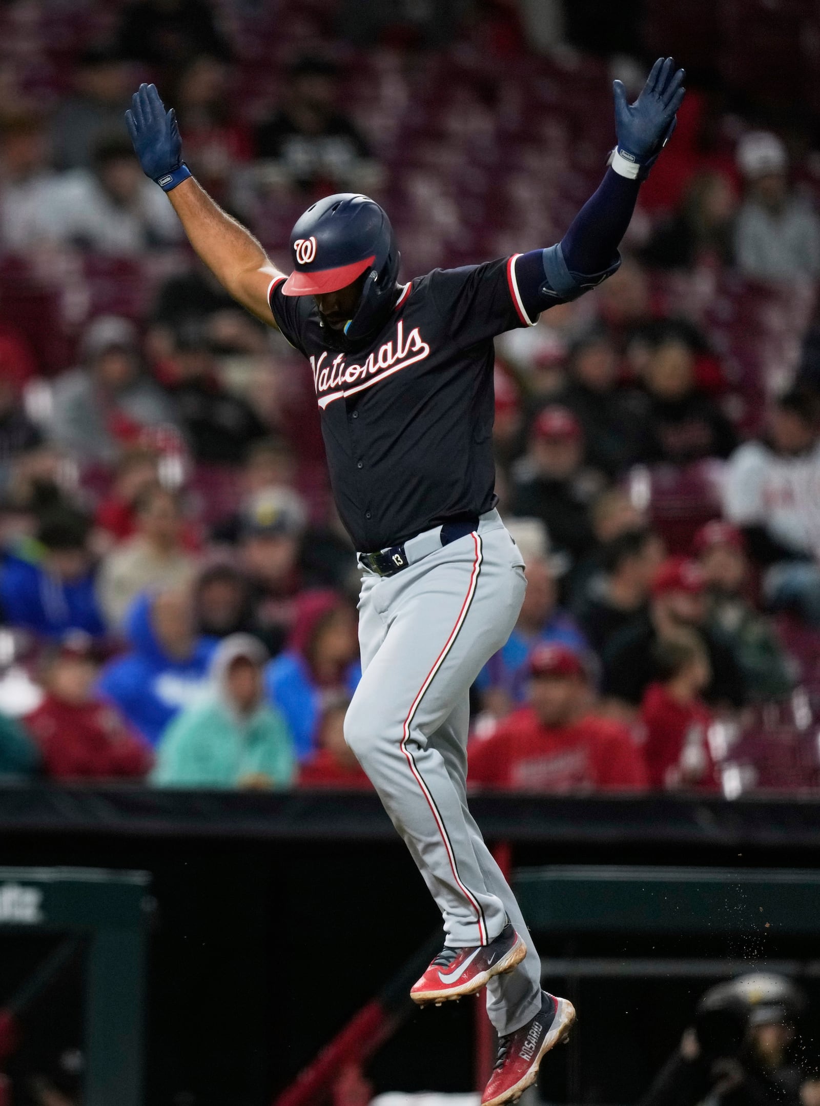 Washington Nationals' Amed Rosario celebrates as he rounds the the bases after hitting a three-run home run in the sixth inning of a baseball game against the Cincinnati Reds, Saturday, May 3, 2025, in Cincinnati. (AP Photo/Carolyn Kaster)
