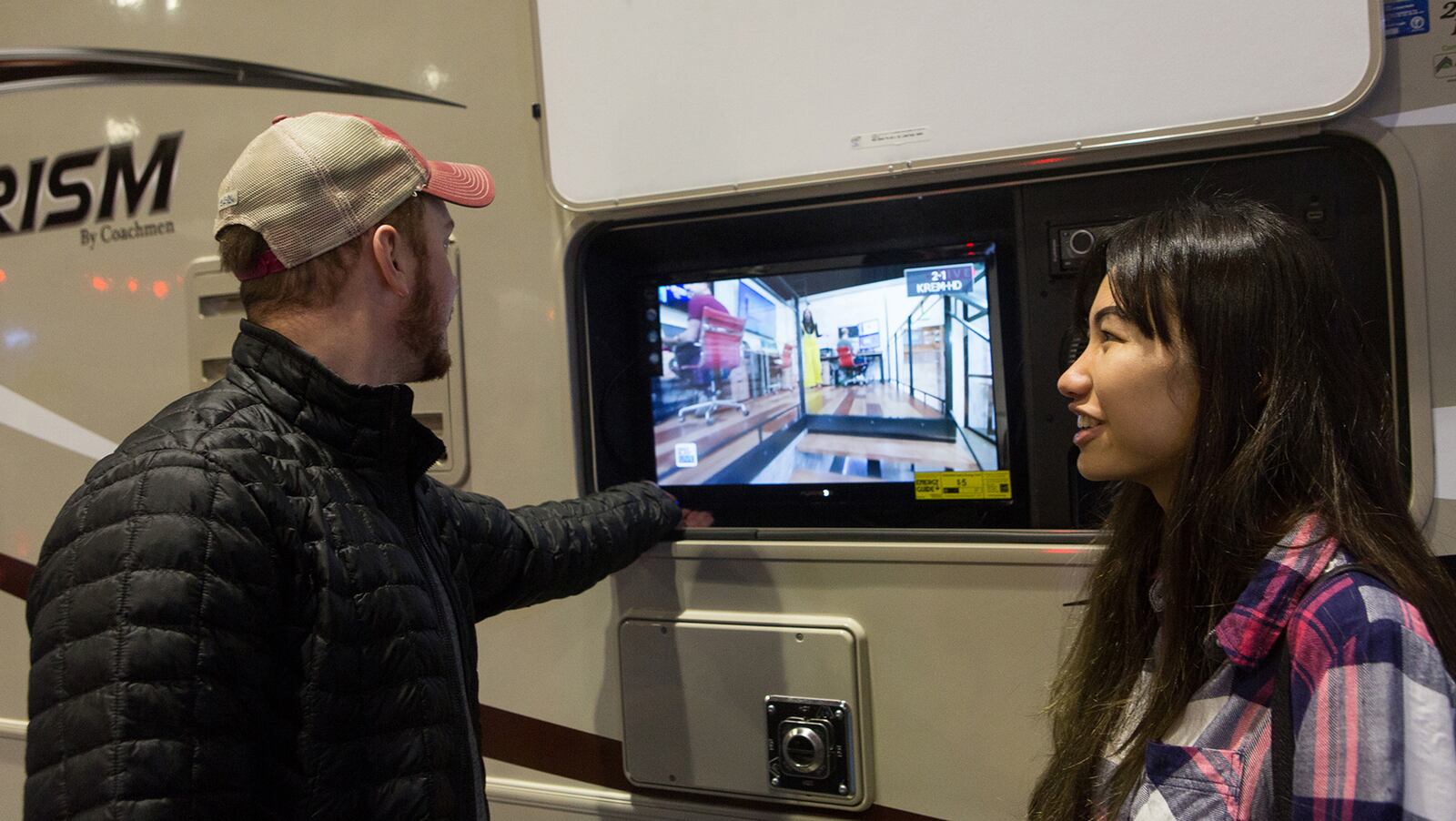 Jesse Coffman (left) and Susie Coffman look at RVs on Thursday, Jan 18. Increasingly the RV industry is pivoting toward younger customers like the Coffmans. (Eli Francovich/THE SPOKESMAN REVIEW/TNS)