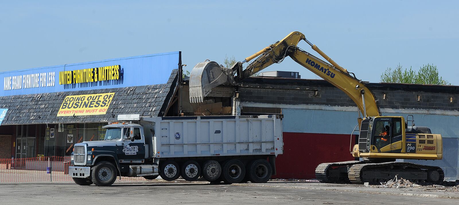 Demolition continues on the Marian shopping center Tuesday, April 27, 2021. The lot is the future home of the Huber Heights branch library. MARSHALL GORBY\STAFF