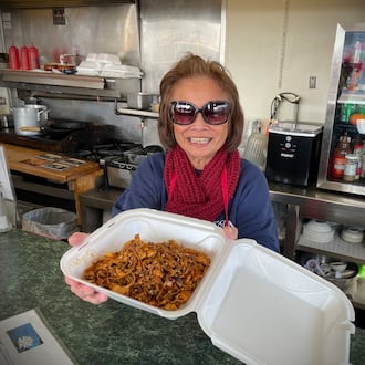 Young Shoop, the owner of White Lotus Café & Diner at 327 E. Third St. in Dayton, is retiring after 21 years. NATALIE JONES/STAFF