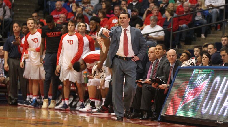 Archie Miller talks to his players during an exhibition game against Findlay. David Jablonski/Staff