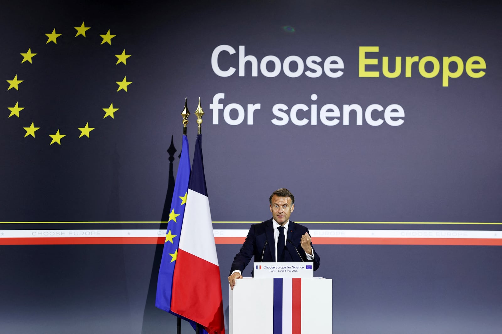 French President Emmanuel Macron delivers his speech at the "Choose Europe for Science" event, to encourage researchers and scientists from all over the world to practice in Europe, at the Sorbonne University in Paris, Monday, May 5, 2025.(Gonzalo Fuentes/Pool via AP)