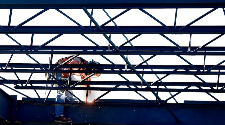 Work continues Friday, March 21, 2025 on a significant element in the Dragons ongoing improvement effort at Day Air Ballpark is the creation of a new enclosed 15’x75’ Batting Tunnel on the third base side of the ballpark, to be completed in mid-to-late April. The tunnel will be viewable for fans, including those spectators on the concourse within the ballpark and those walking outside along Monument Street. MARSHALL GORBY\STAFF