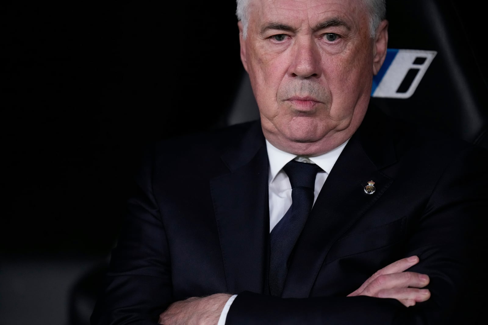 Real Madrid's head coach Carlo Ancelotti waits for the start of a Spanish La Liga soccer match between Real Madrid and Mallorca in Madrid, Spain, Wednesday, May 14, 2025. (AP Photo/Manu Fernandez)