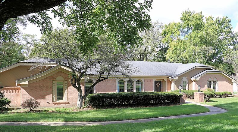 The brick ranch offers about 3,450 sq. ft. of living space. A split floor plan offers two possible main bedroom suites and a circular flow among the main social areas that include an eat-in kitchen, a family room, formal dining room and living room. CONTRIBUTED PHOTO BY KATHY TYLER