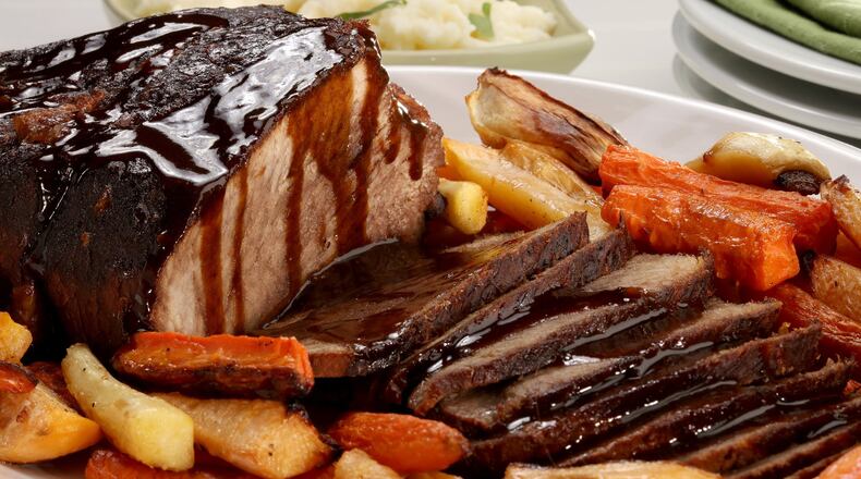 Serve the finished roast with the braising liquid and vegetables or starch of your choice. (Michael Tercha/Chicago Tribune/TNS)