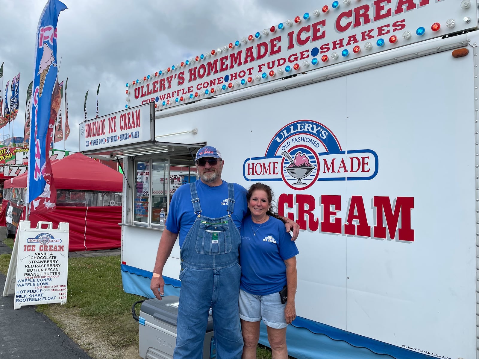 Ullery’s Homemade Ice Cream makes ice cream the old-fashioned way — using salt and ice. Pictured is owner Rob Ullery and his wife, Lorrie. NATALIE JONES/STAFF