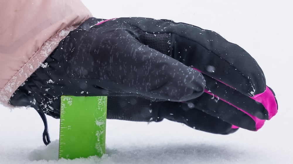 Nearly a foot of snow fell by 11 a.m. Sunday, Jan. 25, 2026 in Southwest Ohio, Indiana and Kentucky. This photo was taken in Madison Twp., Butler County. NICK GRAHAM/STAFF