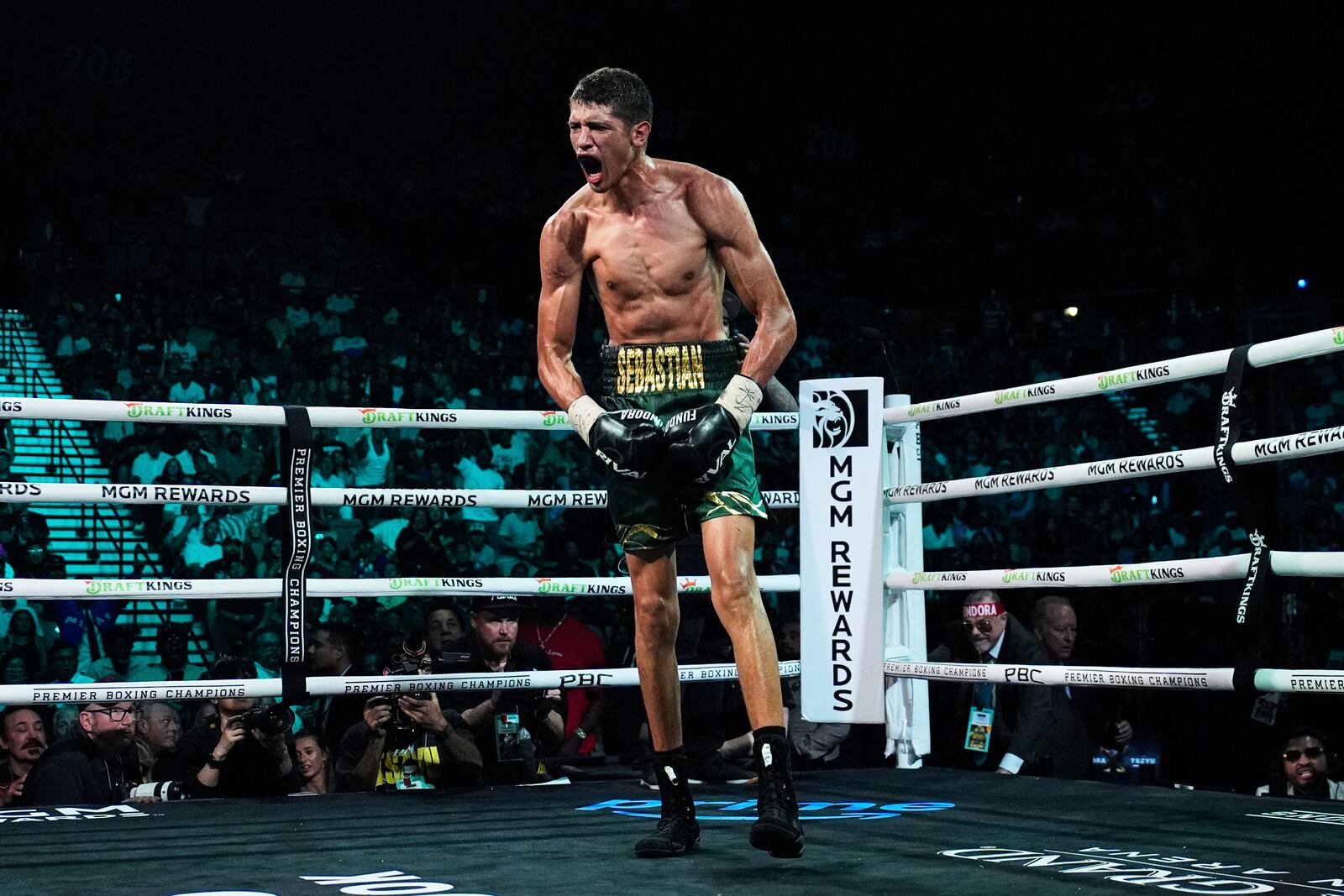 Sebastian Fundora celebrates after winning a super welterweight title boxing match against Tim Tszyu Saturday, July 19, 2025, in Las Vegas. (AP Photo/John Locher)