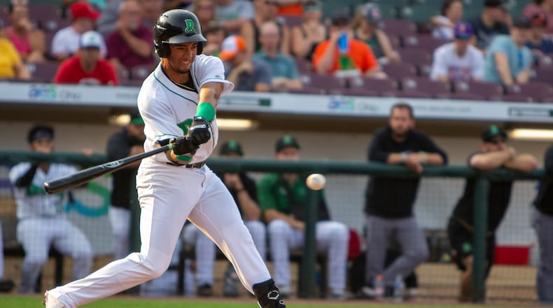 Miguel Hernandez swings for a double in the second inning of Game 1 Wednesday night to produce the Dragons' first run against Great Lakes. Jeff Gilbert/CONTRIBUTED