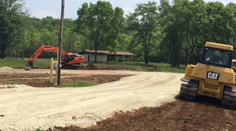 U.S. EPA officials this week are mobilizing heavy earth-moving equipment to remove thousands of tons of lead-contaminated soil from Layer Park in Miami Twp. The lead issues have caused the park’s closure for more than a year. NICK BLIZZARD/STAFF