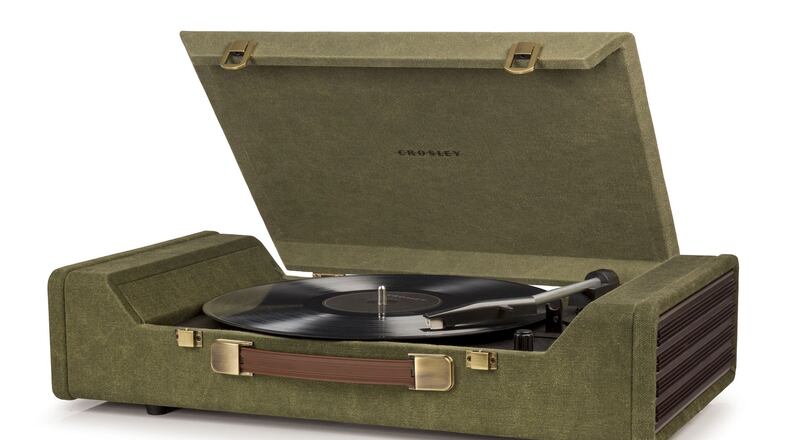 The Crosley Nomad portable turntable s portability makes it simple to move from room to room or even take on a trip. (Handout/TNS)
