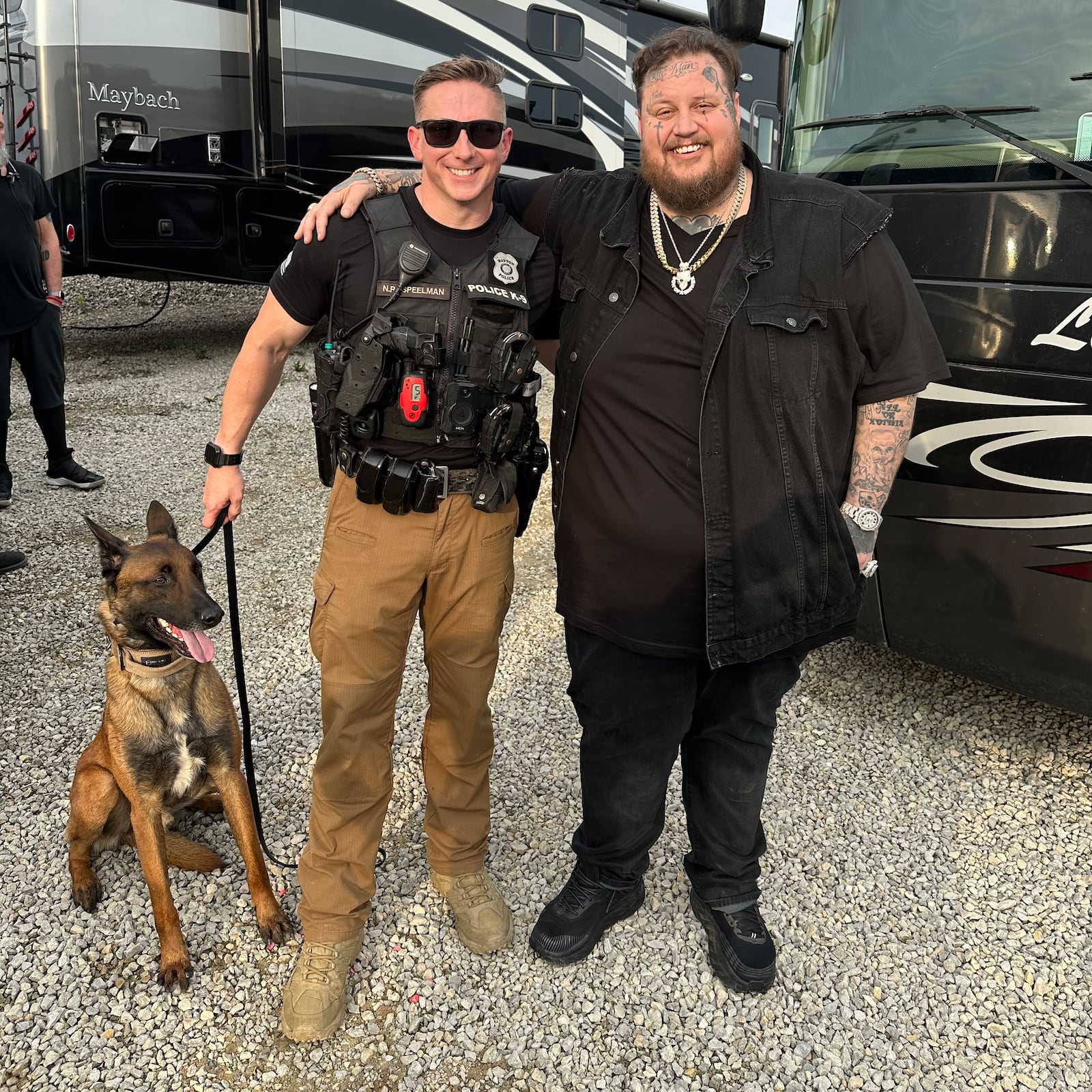 Scooby Doo, the Belgian Malinois canine officer with his handler, Dayton Police officer Nathan Speelman, and the Grammy-winning country singer, rapper and songwriter Jelly Roll at the Country Concert in Fort Loramie in 2023. In the nearly four years he worked with the Dayton Police Department, Scooby Doo secured arenas – and often was befriended – by numerous performers including Ringo Star, comedian Kevin Hart, Robert Plant, Allison Krause, comedian Sebastian Maniscalco, country singers Jordan Davis and Chris Matthews and many WWE stars. CONTRIBUTED PHOTO