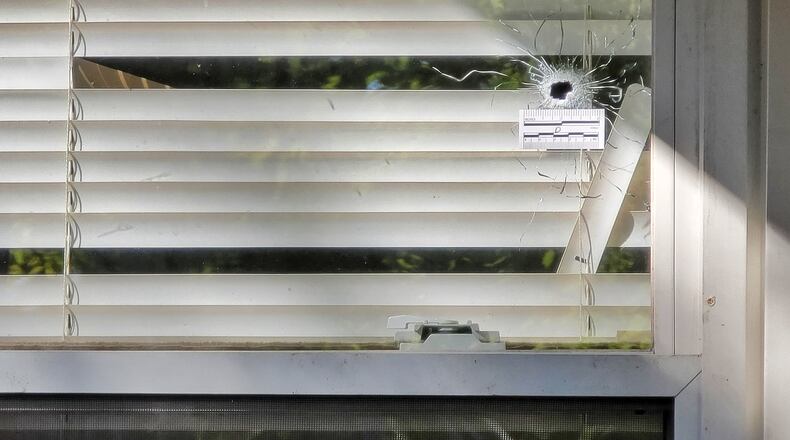 One person died and others were injured early this morning, Aug. 27, 2021, in a shooting on Second Street in Hamilton. NICK GRAHAM/STAFF