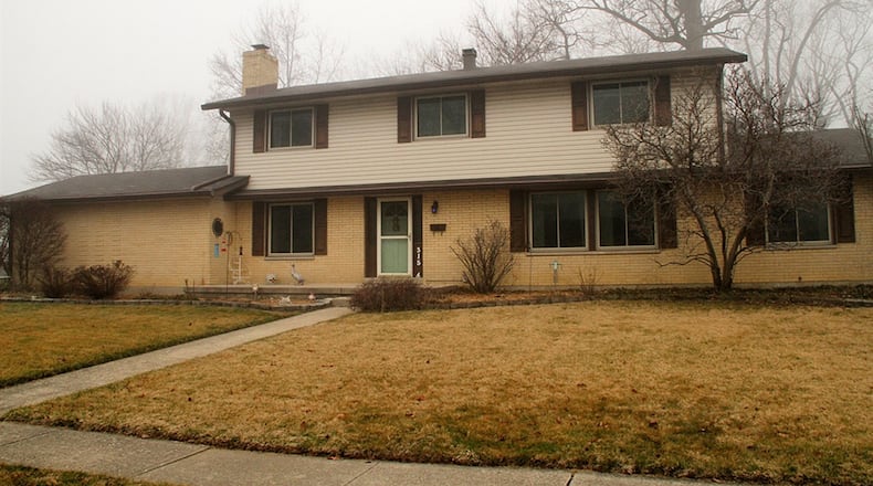 The brick-and-vinyl home with 5 bedrooms has about 2,660 square feet of living space, plus a seasonal sun room and a semi-finished basement. CONTRIBUTED PHOTOS BY KATHY TYLER
