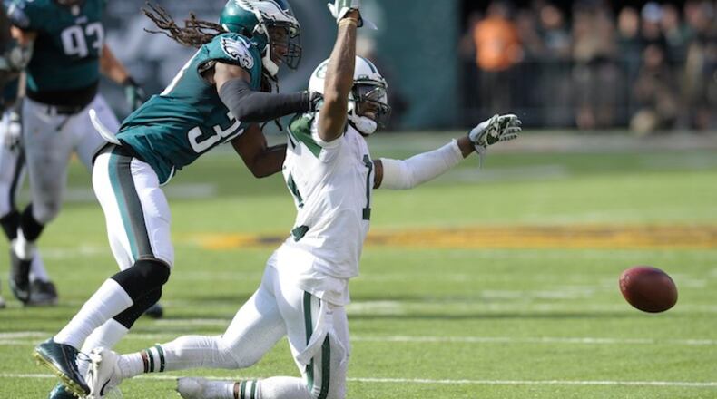 Philadelphia Eagles defensive back E.J. Biggers (38) breaks up a pass intended for New York Jets wide receiver Jeremy Kerley (11) during the fourth quarter of an NFL football game, Sunday, Sept. 27, 2015, in East Rutherford, N.J. (AP Photo/Bill Kostroun)