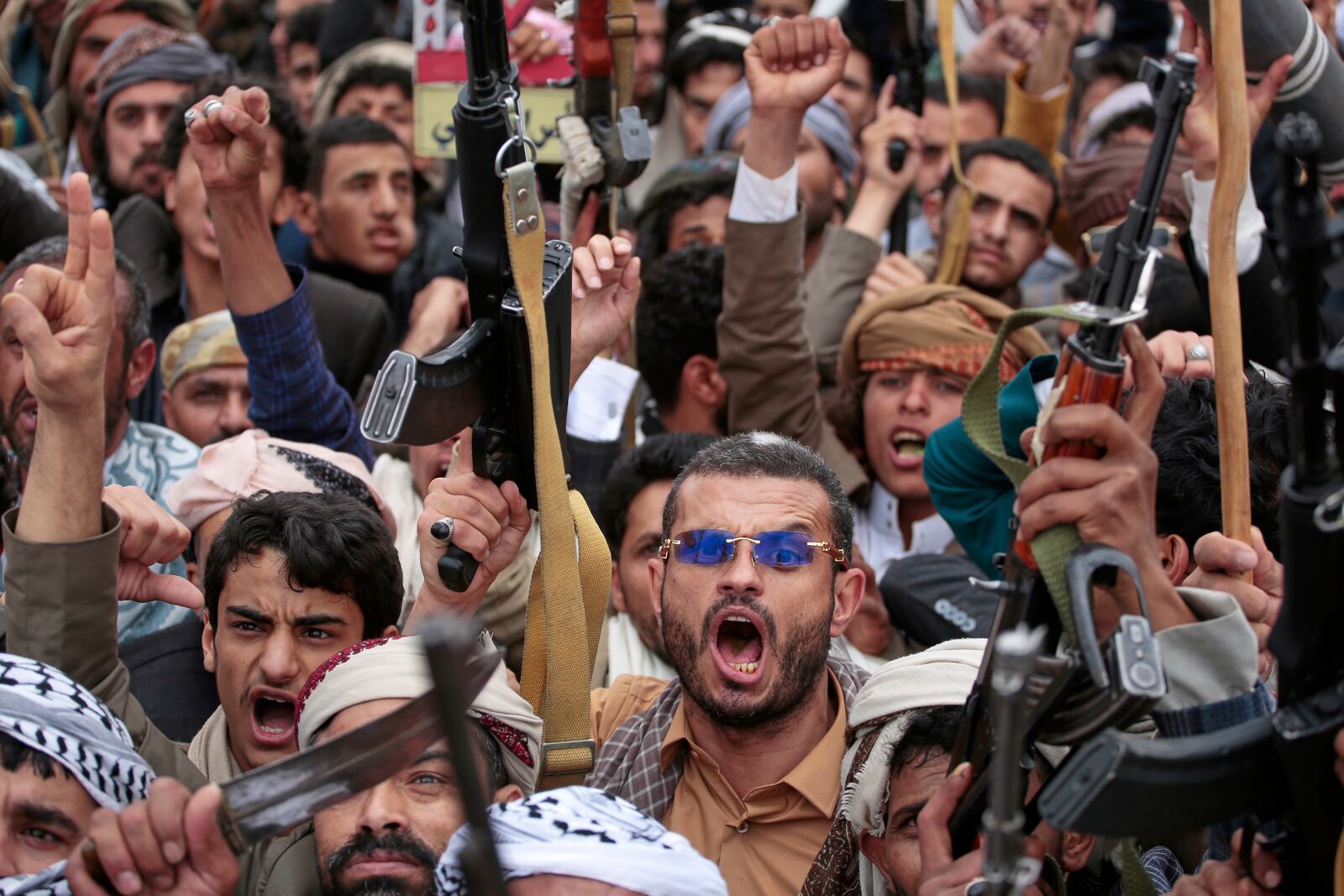 Houthi supporters chant slogans during an anti-U.S. and anti-Israel rally in Sanaa, Yemen, Friday, April 18, 2025. (AP Photo/Osamah Abdulrahman)