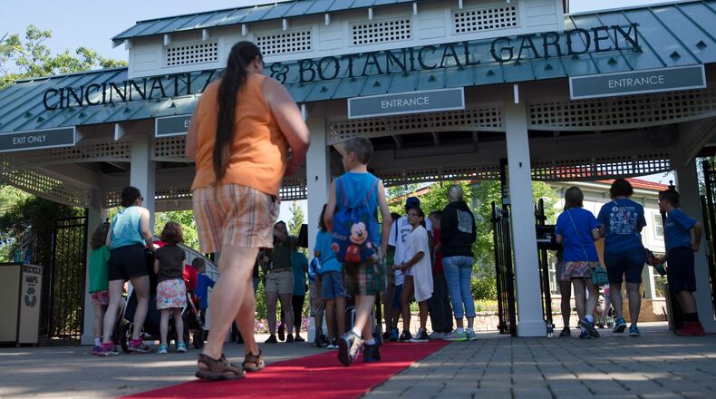 Visitors arrive at the Cincinnati Zoo & Botanical Garden. (AP Photo/John Minchillo)