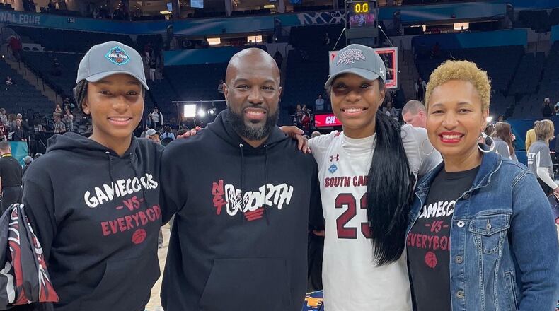 Bree Hall, second from right, is pictured with her sister Brooklyn, left, and parents Bryan and LaShauna after South Carolina's NCAA championship victory against Connecticut on Sunday, April 3, 2022, in Minneapolis, Minn. Photo courtesy of the Hall family