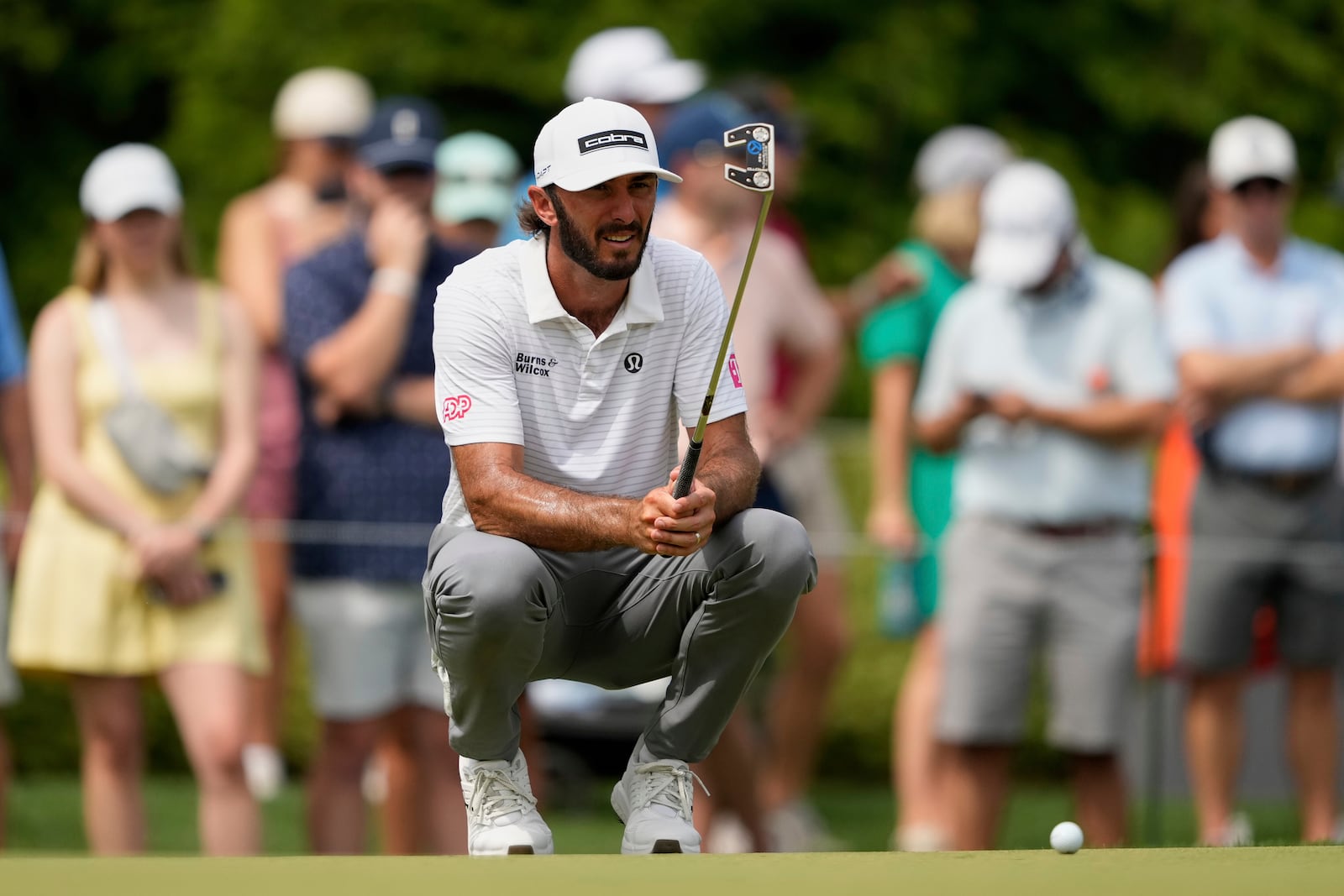 Max Homa lines up a putt on the fifth hole during the second round of the PGA Championship golf tournament at the Quail Hollow Club, Friday, May 16, 2025, in Charlotte, N.C. (AP Photo/Matt York)