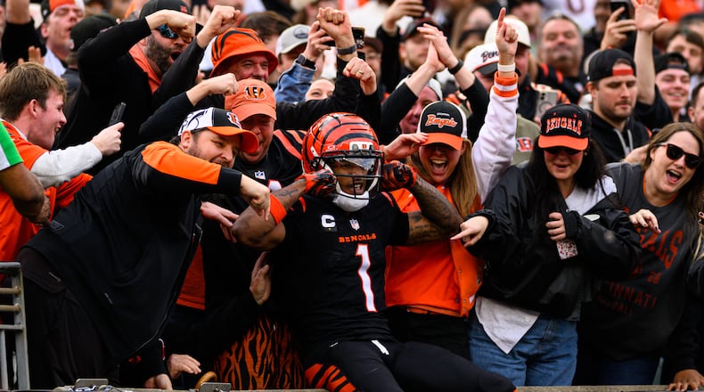 Cincinnati Bengals wide receive Ja'Marr Chase celebrates a touchdown catch in the second quarter during their game against the Arizona Cardinals on Sunday, Dec. 28 at Paycor Stadium. JEREMY MILLER / CONTRIBUTED PHOTO