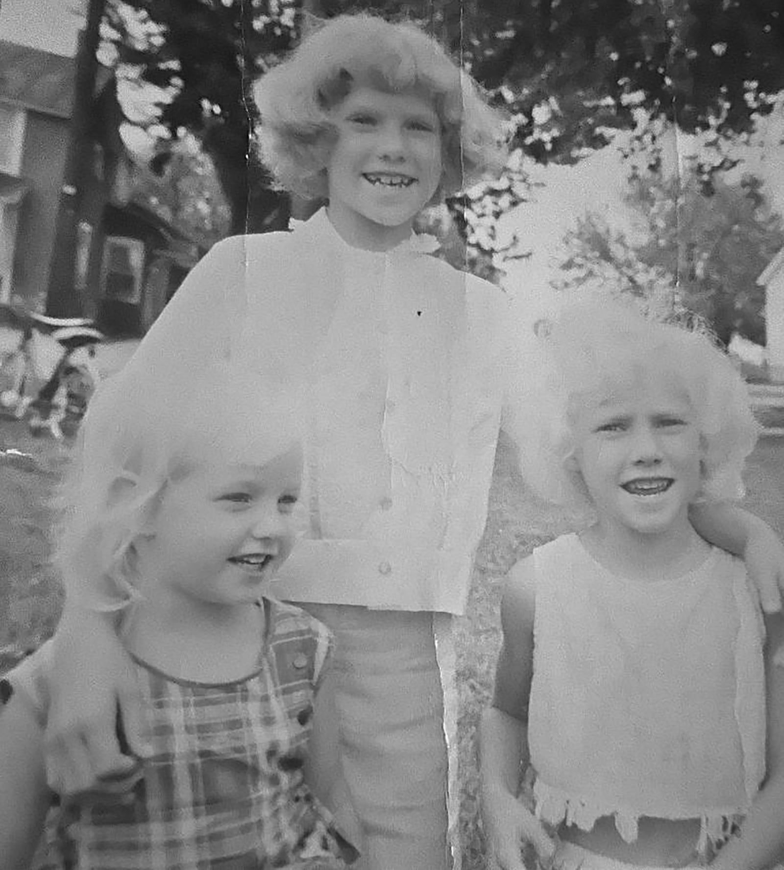 Jeanette McDaniel (Left) with her two older sisters, Charlotte (center) and Yvonne outside of their home in Phillipsburg in 1962. CONTRIBUTED