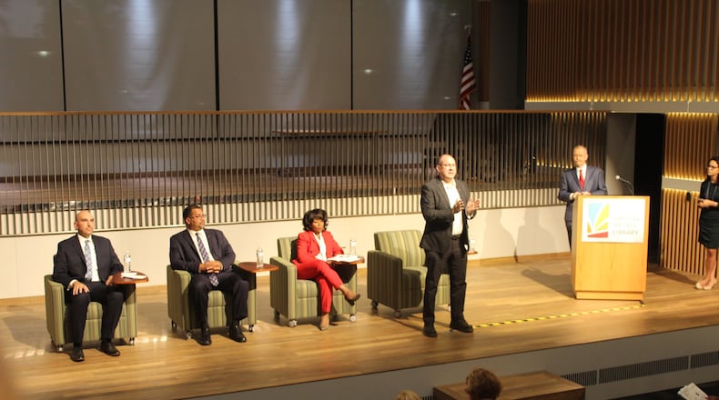 At a recent candidate forum, Dayton City Commission candidates said they believe the Aug. 28 shooting of Javier Harrison and Devin Henderson was murder. Candidates, from left, are Commissioners Matt Joseph and Chris Shaw and challengers Shenise Turner-Sloss and David Esrati. CORNELIUS FROLIK / STAFF