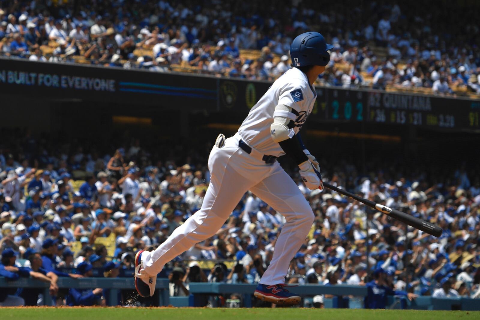 Los Angeles Dodgers' Shohei Ohtani heads to first after hitting a two-run home run during the third inning of a baseball game against the Milwaukee Brewers, Sunday, July 20, 2025, in Los Angeles. (AP Photo/Mark J. Terrill)