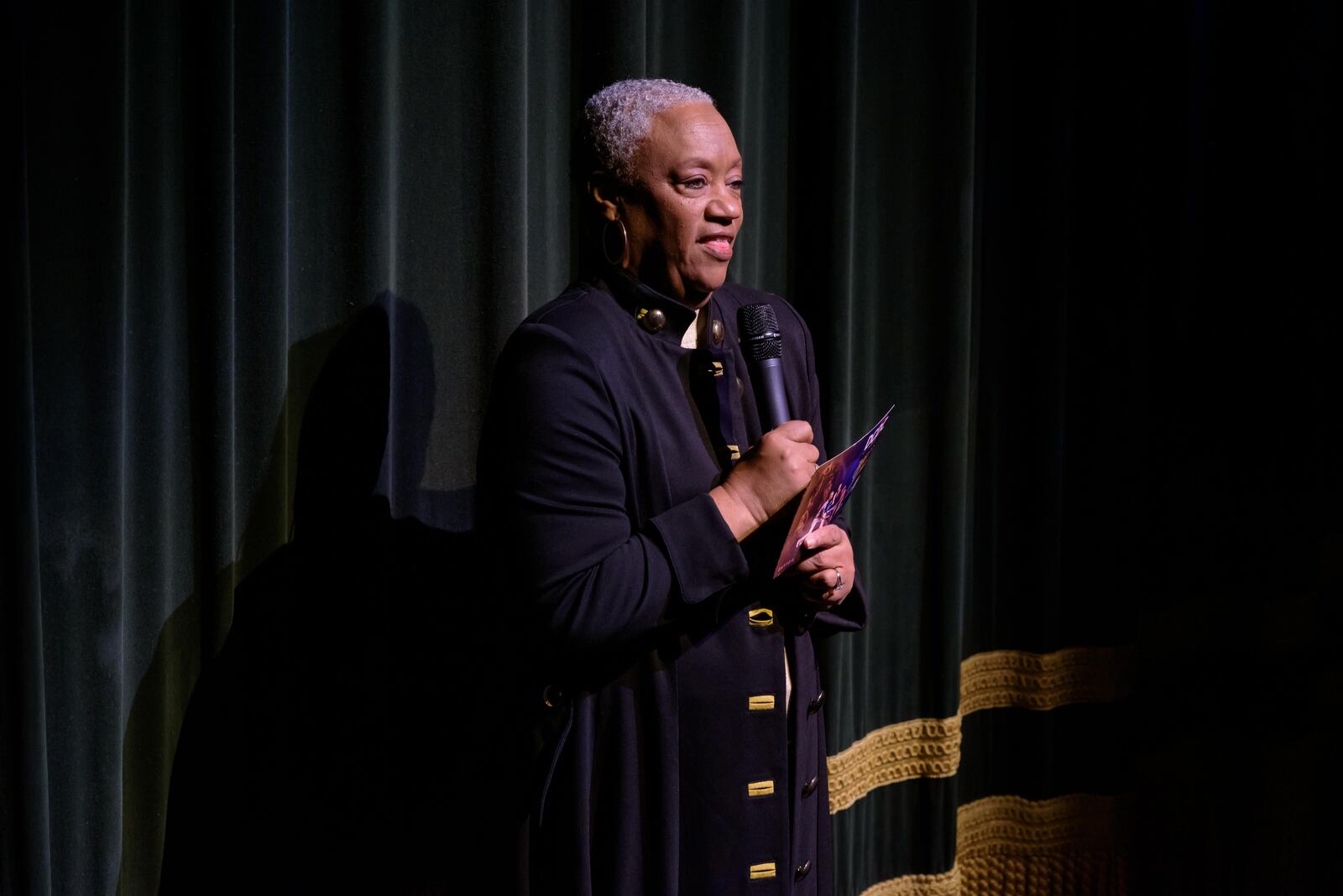 Dayton Contemporary Dance Company Chief Executive & Artistic Director Debbie Blunden-Diggs introduces 'Power & Presence' at Victoria Theatre in downtown Dayton on Sunday, Mar. 2, 2025. Ms. Blunden-Diggs is the daughter of DCDC founder Jeraldyne Blunden. TOM GILLIAM / CONTRIBUTING PHOTOGRAPHER