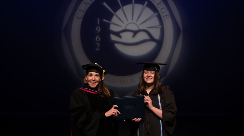 Lanna Kunzelman with Clark State President Dr. Jo Alice Blondin as she receives her associate's degree. CONTRIBUTED