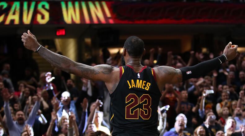 CLEVELAND, OH - MAY 05: LeBron James #23 of the Cleveland Cavaliers celebrates after hitting the game winning shot to beat the Toronto Raptors 105-103 in Game Three of the Eastern Conference Semifinals during the 2018 NBA Playoffs at Quicken Loans Arena on May 5, 2018 in Cleveland, Ohio. (Photo by Gregory Shamus/Getty Images)